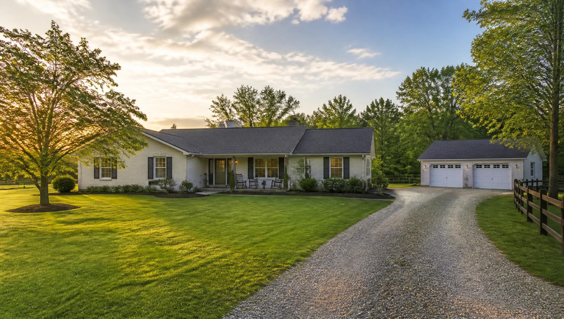 Countryside ranch home with detached garage on a spacious lot
